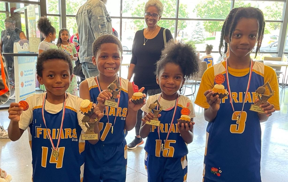 Big Smiles on Junior Dribblers: At the Friars Club, outstanding junior and high school students can volunteer to coach and mentor more than Jr. Dribblers K-2nd grade. The coaches get the training, and the kids score the points—and the cupcakes! (Photo courtesy of Friars Club Cincinnati)