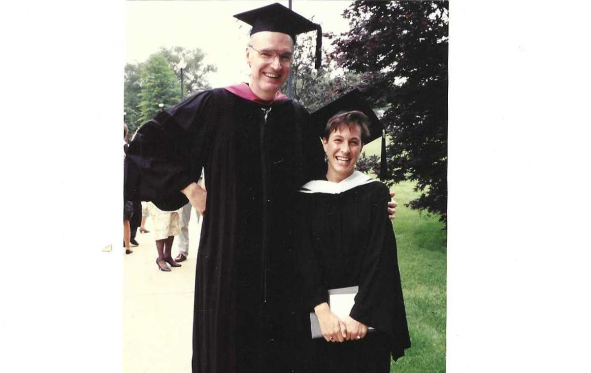 <!--StartFragment-->Br. Joe congratulates a student after a Qunicy University graduation. He taught sociology at the school for 38 years. (Photo from Br. Joe)<!--EndFragment-->