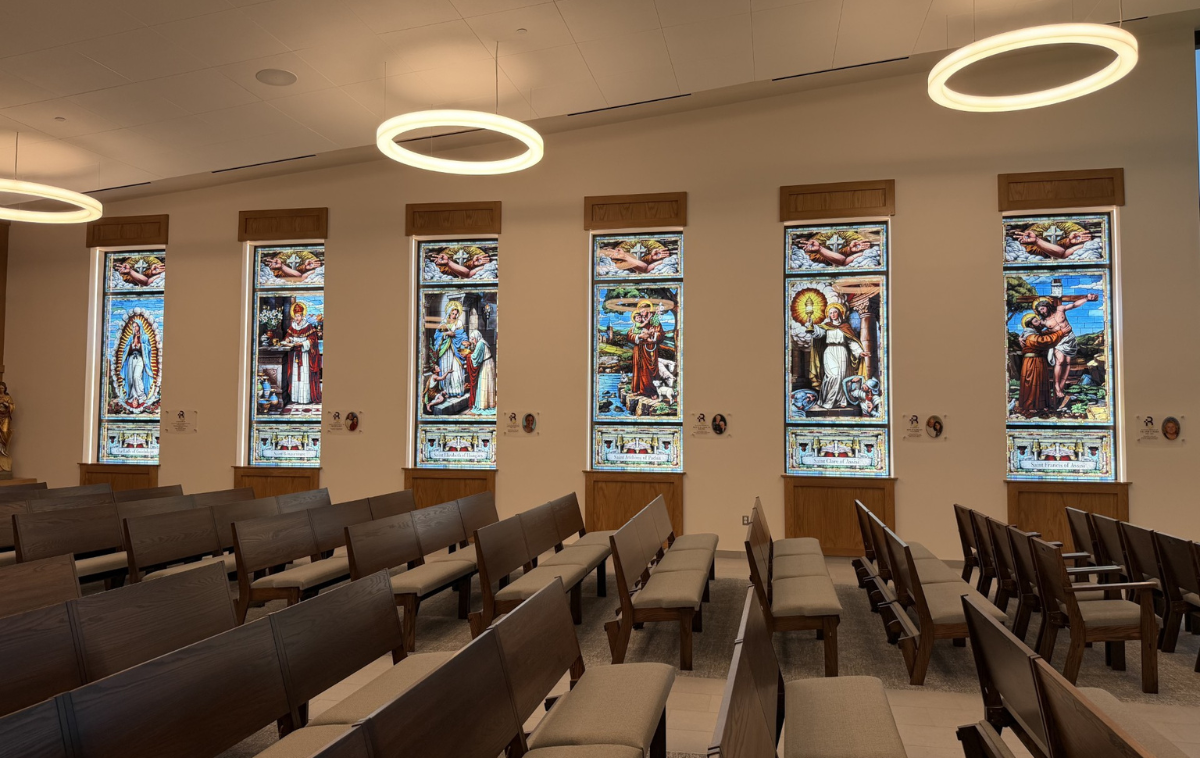 Among the stained-glass windows incorporated into the chapel's design are Our Lady of Guadalupe, honoring the Franciscan province that sponsors the school, and the work of the friars from the time of St. Francis to present day. (Photo courtesy of Roger Bacon High School)