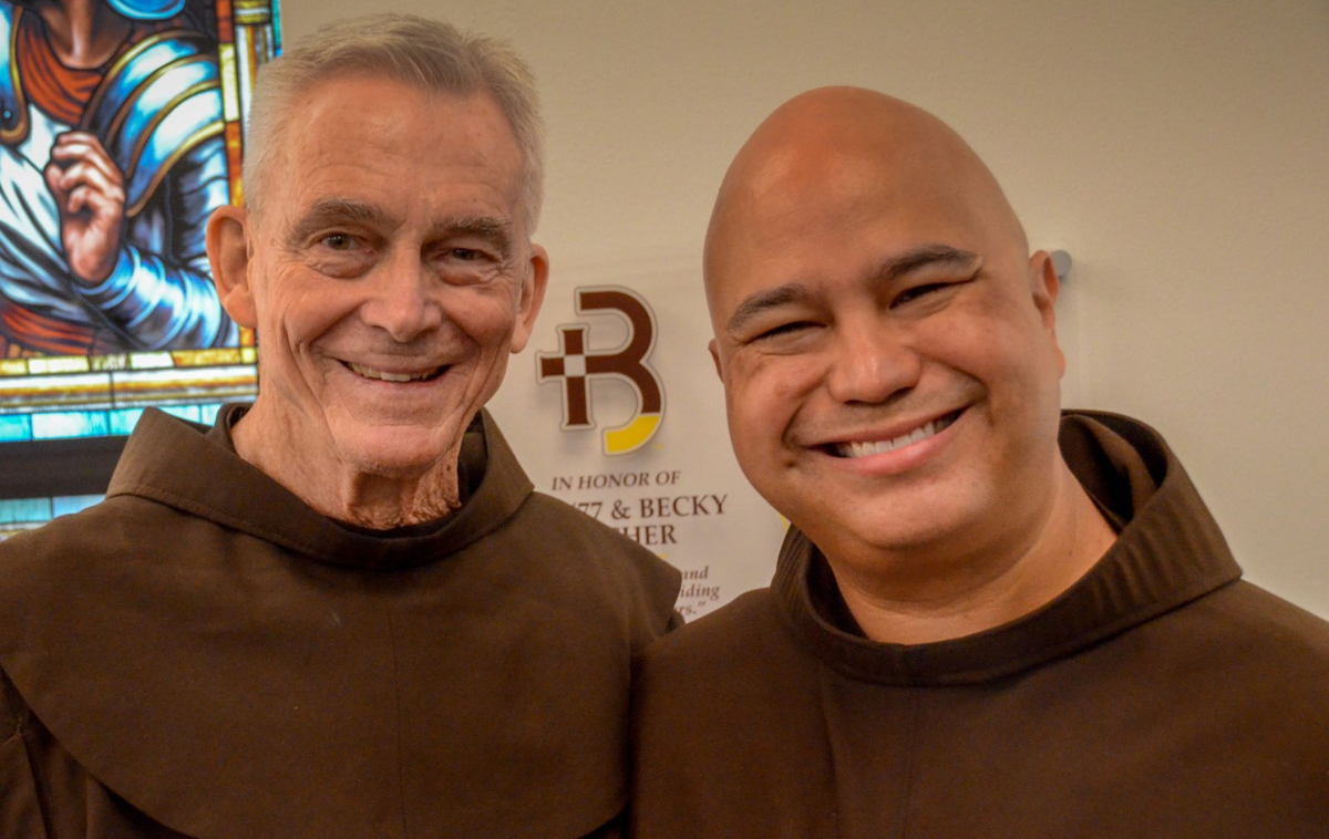 Br. Jim Bok, OFM, left, a former principal and teacher and current board member of Roger Bacon, with Provincial Councilor Br. Roger Lopez, OFM, who formerly ministered at the school. (Photo courtesy of Br. Frank Jasper, OFM)