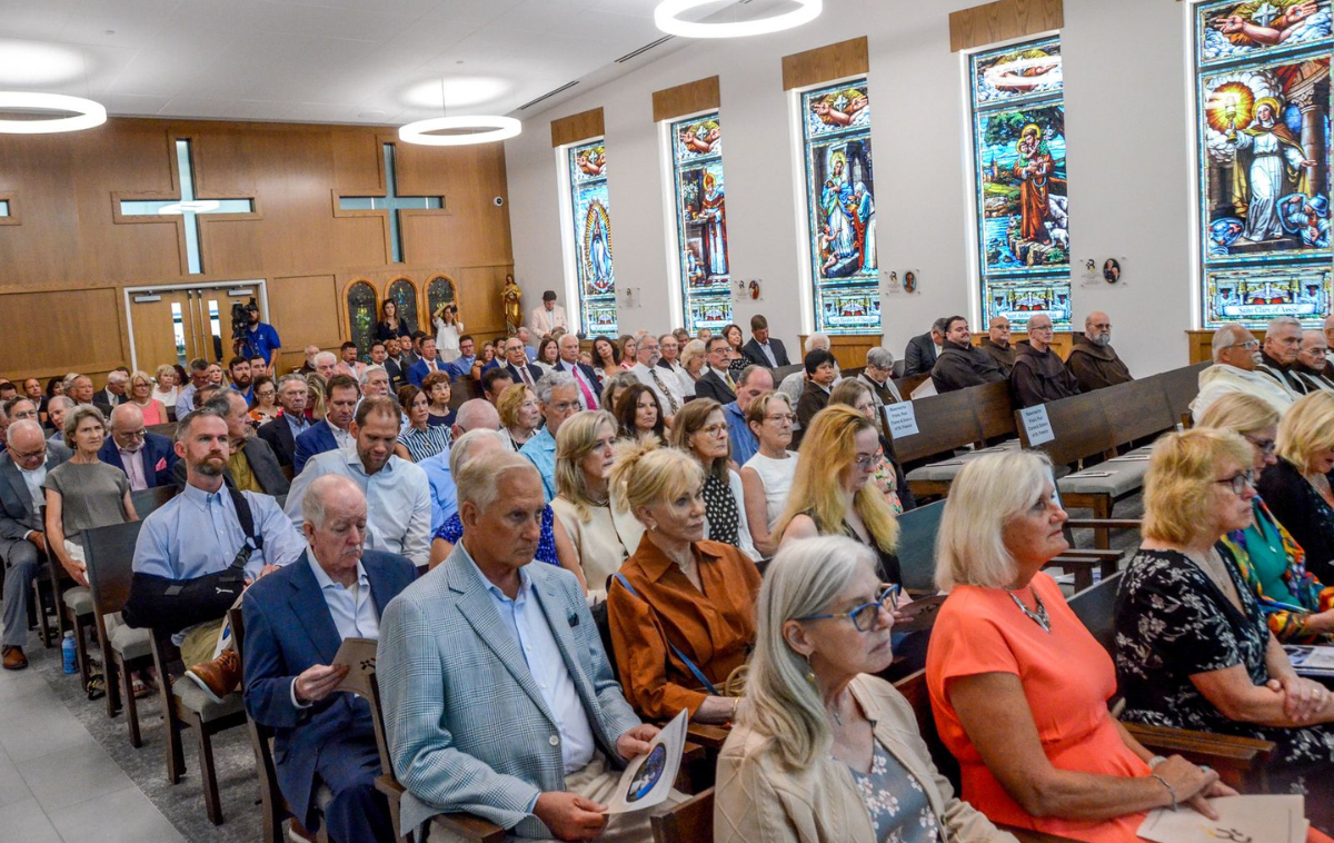Friars, Poor Clares, and Roger Bacon alumni and friends filled the new chapel for its dedication. (Photo courtesy of Br. Frank Jasper, OFM)