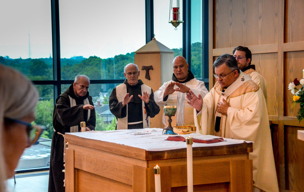 Archbishop Robert Casey celebrates the first Mass in the new chapel alongside concelebrants Brothers Fred Link, OFM, Bill Farris, OFM, and Roger Lopez, OFM, and Deacon Joshua Richter, OFM. (Photo courtesy of Br. Frank Jasper, OFM)