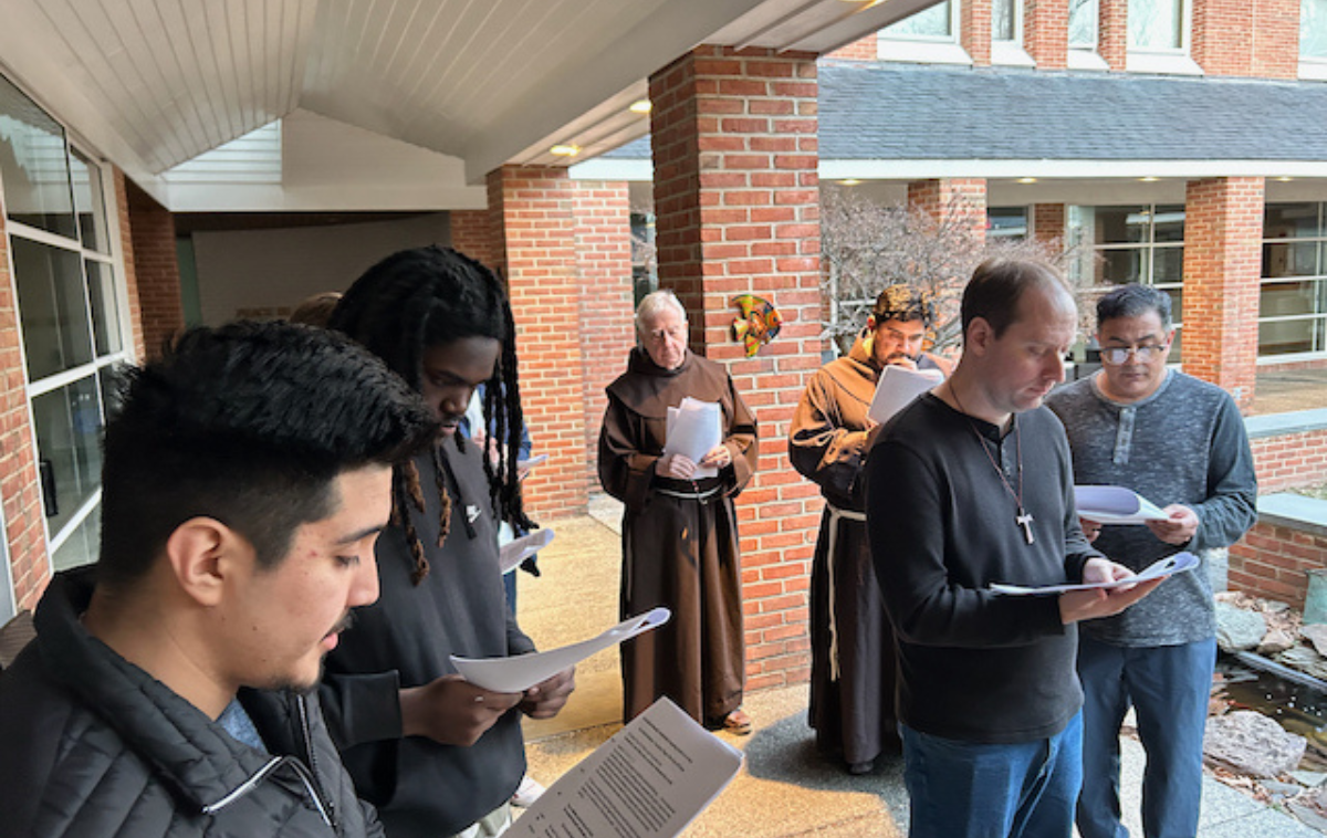 Discerners and friars participate in outdoor Stations of the Cross at Holy Name College in Silver Spring, MD. (Photo courtesy of Br. Greg)
