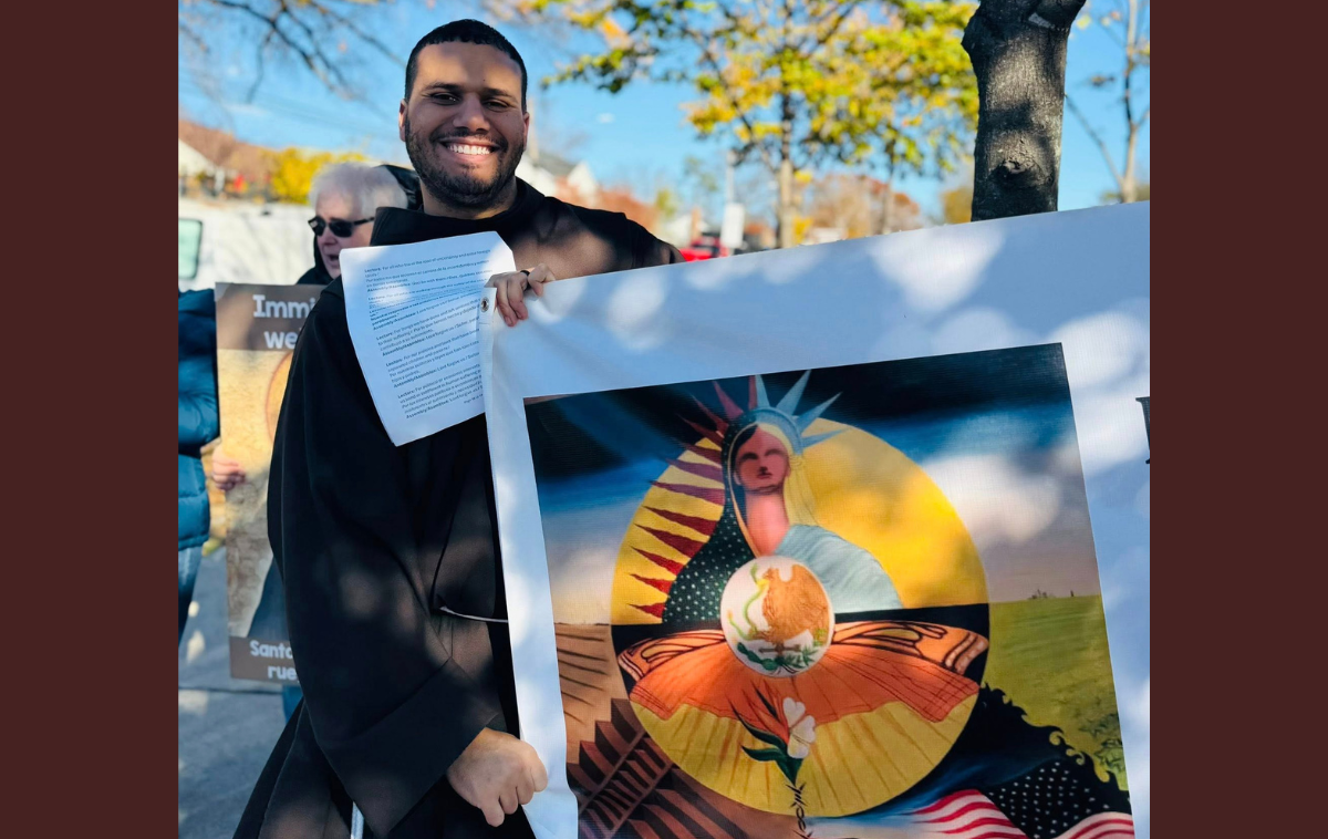 Br. Daniel Cruz, OFM, participates in a public moment of witness in support of immigrants. The diversity of Silver Spring, Maryland&rsquo;s population is reflected in parish life. (Photo by Edwin Mendez)