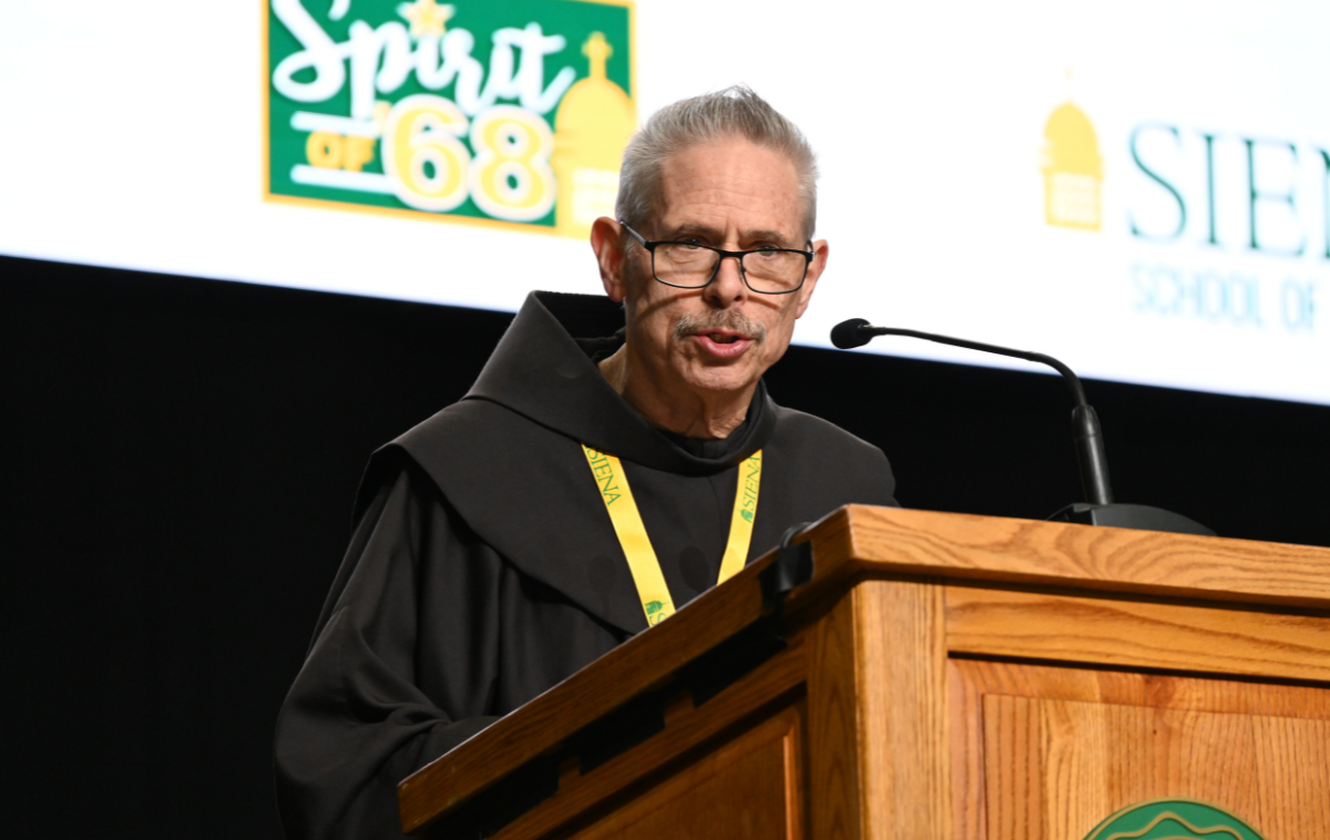 Br. Michael Perry, OFM, director of the Laudato Si&rsquo; Center for Integral Ecology, addresses attendees during the Feb. 5 symposium. (Photo courtesy of Siena University)