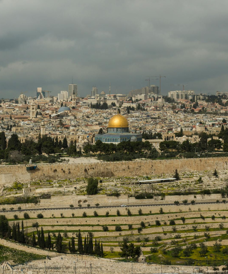 A golden dome and skyline.